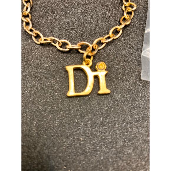 DIAMONDS INTERNATIONAL "Di" GOLD TONE LINK CHARM BRACELET AND Dolphin CHARM - Picture 2 of 8